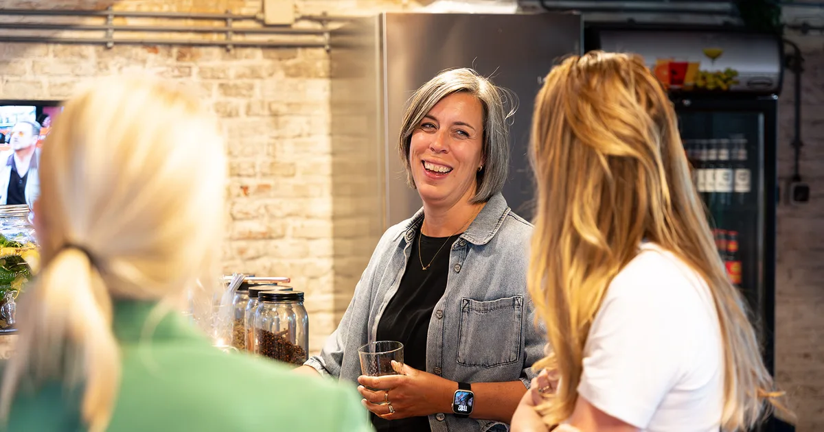 Professionals in conversation at SUE Behavioural Design in Amsterdam