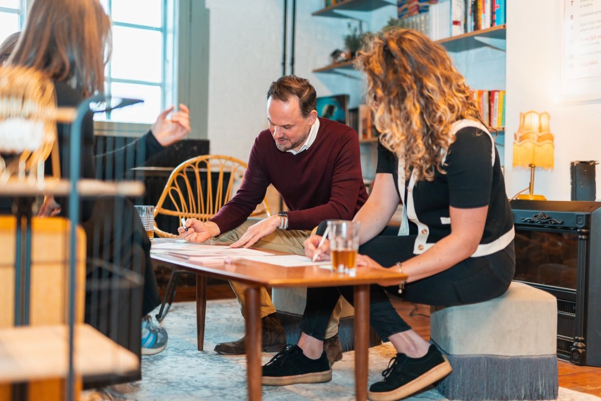 Team designing behavioural interventions during Behavioural Design Sprint